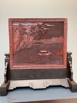 A rectangular Chinese carved red lacquer 'dragon' table screen, later wooden stand, Qianlong — photo 15