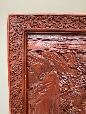 A rectangular Chinese carved red lacquer 'dragon' table screen, later wooden stand, Qianlong — photo 16
