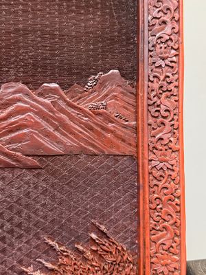 A rectangular Chinese carved red lacquer 'dragon' table screen, later wooden stand, Qianlong — photo 20