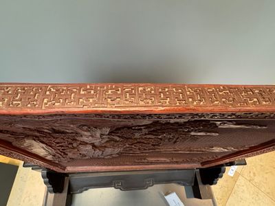A rectangular Chinese carved red lacquer 'dragon' table screen, later wooden stand, Qianlong — photo 34
