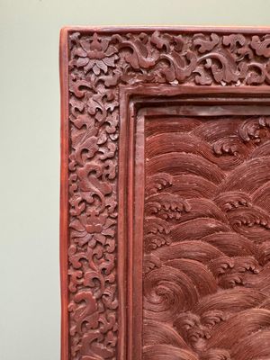A rectangular Chinese carved red lacquer 'dragon' table screen, later wooden stand, Qianlong — photo 5