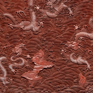 A rectangular Chinese carved red lacquer 'dragon' table screen, later wooden stand, Qianlong — photo 3