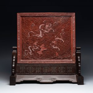 A rectangular Chinese carved red lacquer 'dragon' table screen, later wooden stand, Qianlong — photo 4