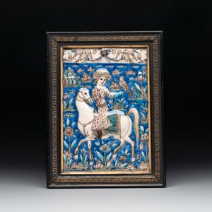 A rectangular Qajar relief-moulded tile with a falconer on horseback, Iran, 19th C. — photo 1