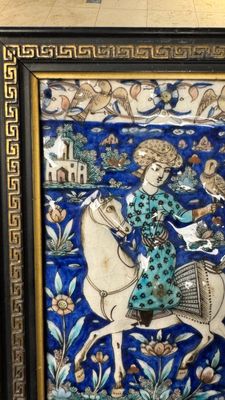 A rectangular Qajar relief-moulded tile with a prince on horseback, Iran, 19th C. — photo 1