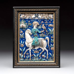A rectangular Qajar relief-moulded tile with a prince on horseback, Iran, 19th C. — photo 1