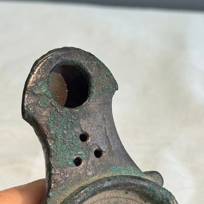 A Roman bronze oil lamp — photo 7