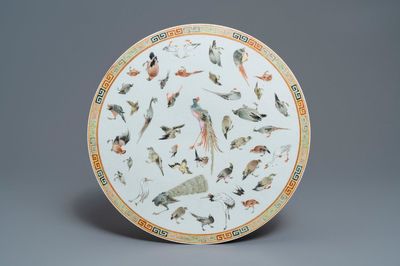 A round Chinese famille rose 'birds' plaque, 19th C.