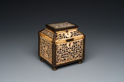 A Russian Kholmogory reticulated walrus bone casket with brass mounts, 17th C.