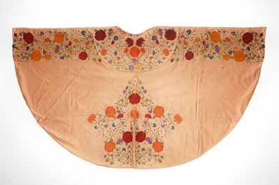 A salmon silk matador cape with embroidered floral design, Spain, 1st half 20th C.