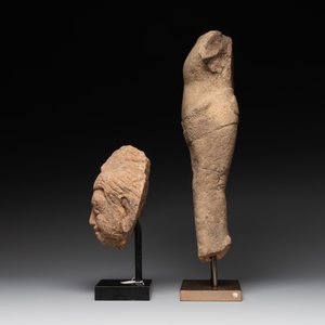 A sandstone torso and a Buddha head, Cambodia, late Khmer period, 13/14th C. — photo 2