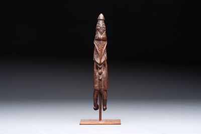 A Sepik Ramu wooden figure, Papua New Guinea