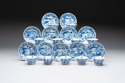 A set of 11 Chinese blue and white cups and saucers with riverscape design, Kangxi