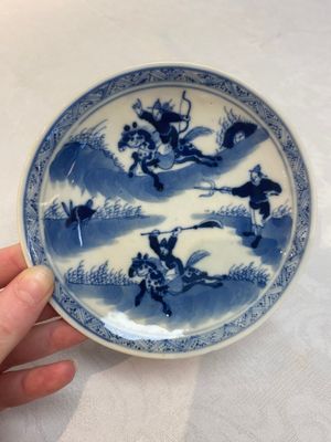 A set of 11 Chinese blue and white 'rabbit hunt' cups and saucers, Qianlong mark, 19th C. — photo 1