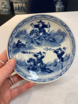 A set of 11 Chinese blue and white 'rabbit hunt' cups and saucers, Qianlong mark, 19th C. — photo 19