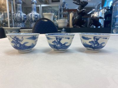 A set of 11 Chinese blue and white 'rabbit hunt' cups and saucers, Qianlong mark, 19th C. — photo 24