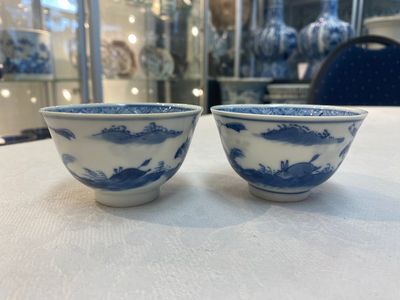 A set of 11 Chinese blue and white 'rabbit hunt' cups and saucers, Qianlong mark, 19th C. — photo 47