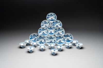 A set of 11 Chinese blue and white 'rabbit hunt' cups and saucers, Qianlong mark, 19th C.