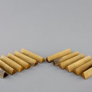 A set of 12 rare polished rhinoceros horn knife rests, ca. 1900 — photo 1