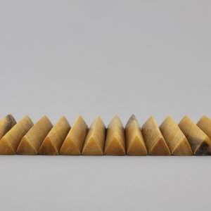 A set of 12 rare polished rhinoceros horn knife rests, ca. 1900 — photo 2