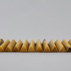 A set of 12 rare polished rhinoceros horn knife rests, ca. 1900 — photo 3