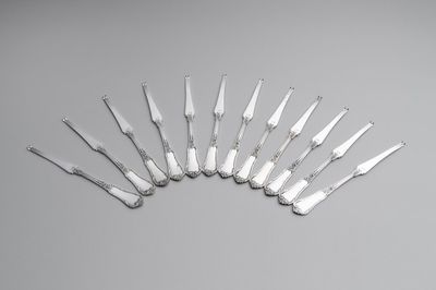 A set of 12 silver crustacean forks, 835/000, Wolfers Frères, Brussels, 20th C.