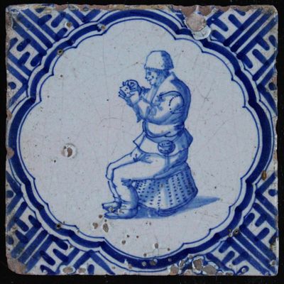 A set of 15 Dutch Delft blue and white tiles with various scenes of people, Wan-Li corners, 17th C.