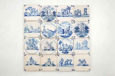 A set of 16 Dutch Delft blue and white biblical tiles, 17/18th C.