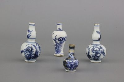 A set of 4 Chinese porcelain blue and white miniature doll house vases, 18th C.