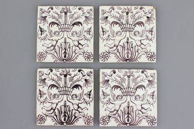 A set of 4 Dutch Delft manganese tiles with putti, 18th C.