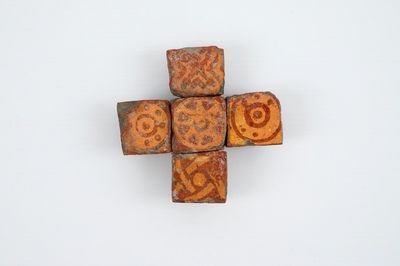 A set of 5 medieval tiles on a cross shaped mount, 13/14th C., Baptismal Chapel Wenduine