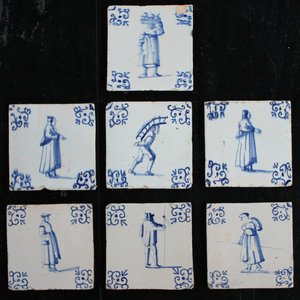 A set of 7 Dutch Delft blue and white tiles with various figures, 17th C. — photo 1