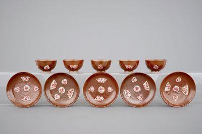 A set of five Chinese batavia brown, gred and gilt cups and saucers, 18th C.