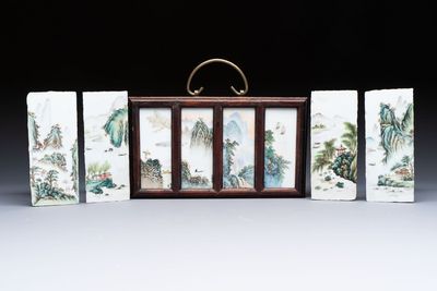 A set of four Chinese famille rose 'Landscape' plaques mounted in a wooden frame, signed Wang Yunquan 王雲泉, together with four plaques, 20th C.