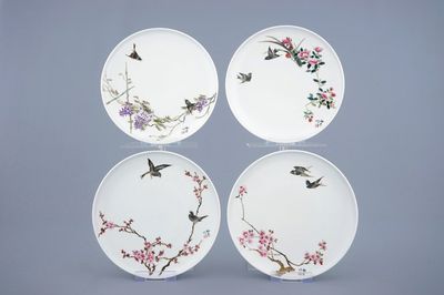 A set of four Chinese famille rose plates with birds and flowers, 20th C.