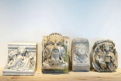 A set of four plaster casts of wall consoles, 19/20th C., Bruges