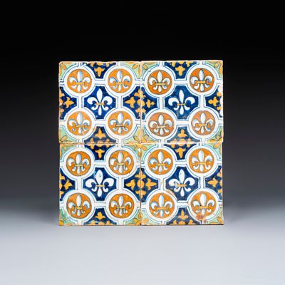 A set of four rare polychrome Dutch Delft maiolica tiles with fleur-de-lys, early 17th C.