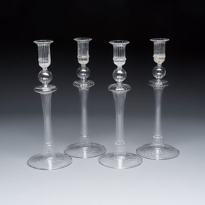 A set of four ribbed blown-glass candlesticks, 20th C.
