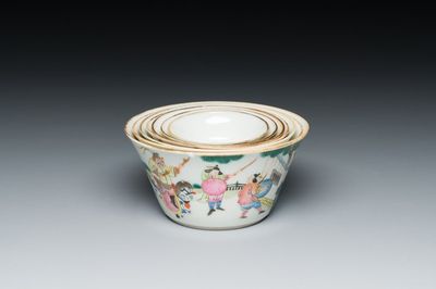 A set of seven Chinese famille rose nesting bowls with narrative design, Daoguang