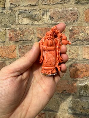 A set of seven Chinese red coral figures on wooden stand, 19/20th C. — photo 1