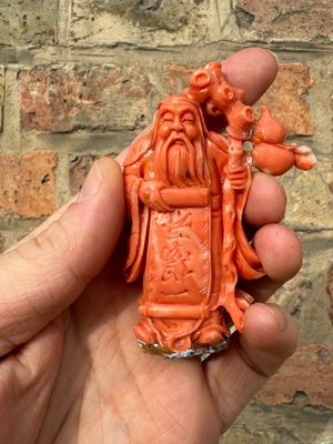 A set of seven Chinese red coral figures on wooden stand, 19/20th C. — photo 2
