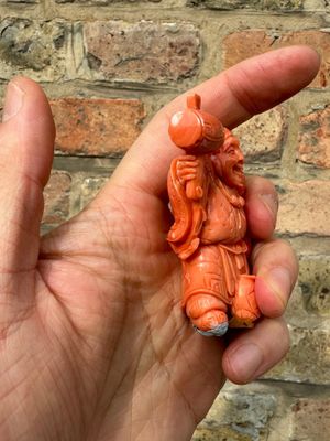 A set of seven Chinese red coral figures on wooden stand, 19/20th C. — photo 38