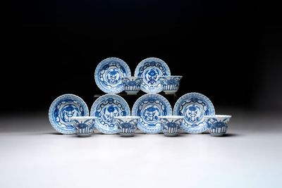 A set of six Chinese blue and white cups and saucers with floral design, Kangxi mark, 19th C.