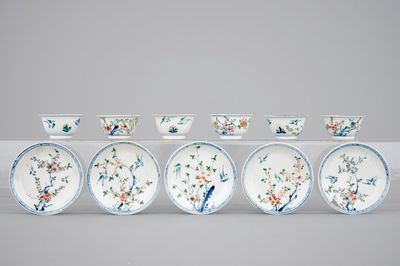 A set of six Chinese famille verte cups and five saucers, Kangxi, 18th C.
