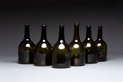 A set of six dark green glass mallet-shaped bottles, possibly France or England, 19th C. or earlier