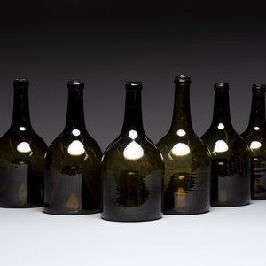 A set of six dark green glass mallet-shaped bottles, possibly France or England, 19th C. or earlier — photo 1