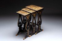 A set of three Chinese Canton gilt-lacquered nesting tables with narrative design, 19th C.