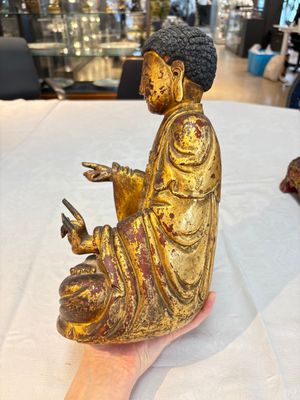 A set of three Chinese or Vietnamese gilt-lacquered wooden sculptures of Buddha, 18/19th C. — photo 49