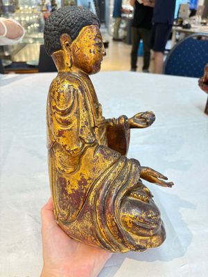 A set of three Chinese or Vietnamese gilt-lacquered wooden sculptures of Buddha, 18/19th C. — photo 5