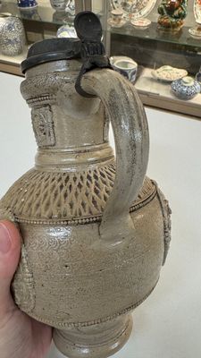 A Siegburg stoneware jug with mounted pewter lid, dated 1594 — photo 11